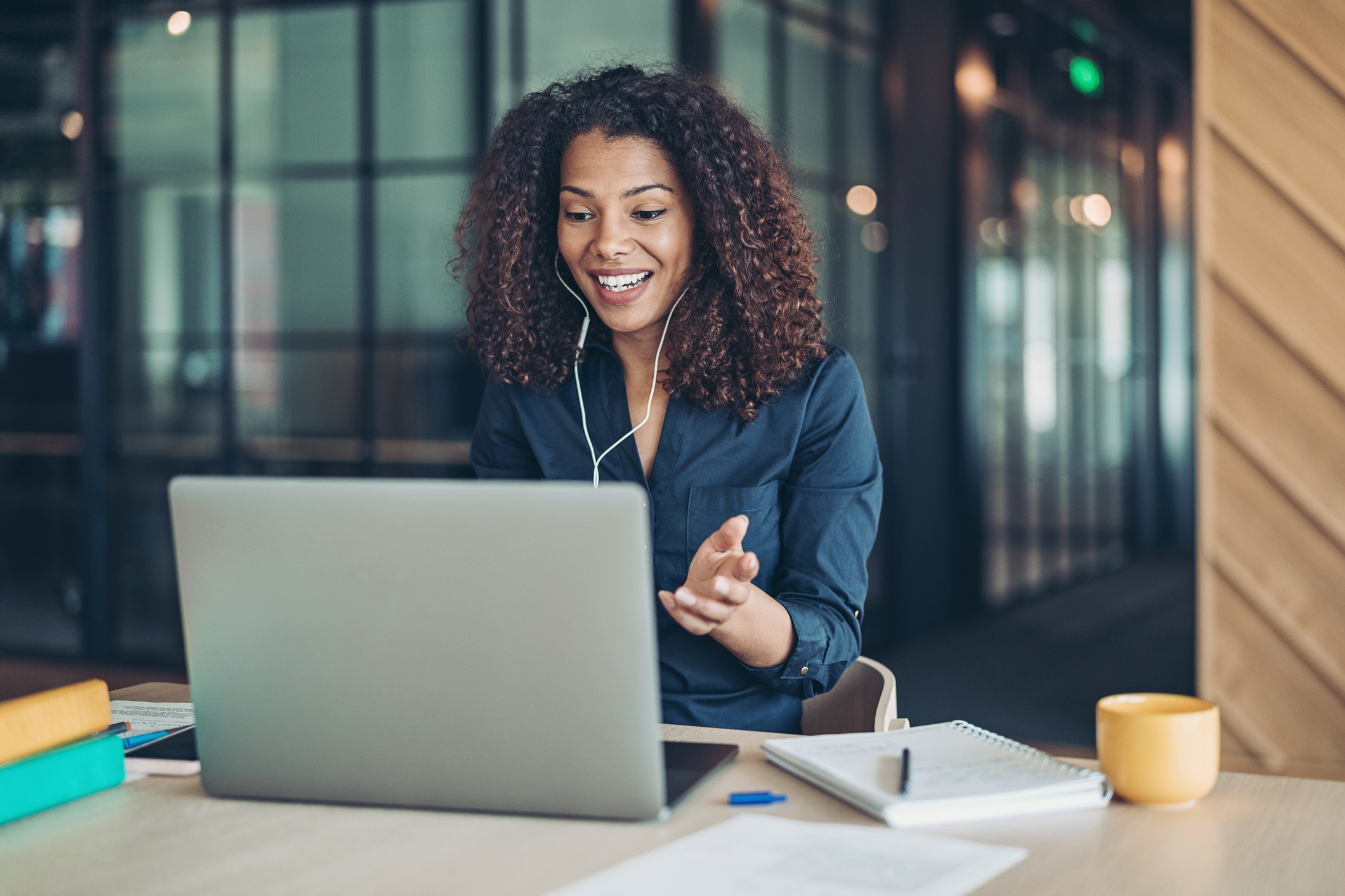 Smiling businesswoman during a video call in the office